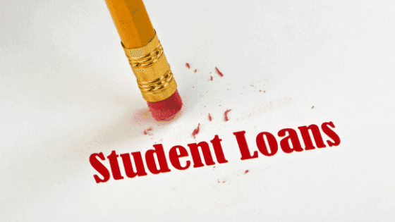 A pencil eraser rubbing out the words student loans from a sheet of paper